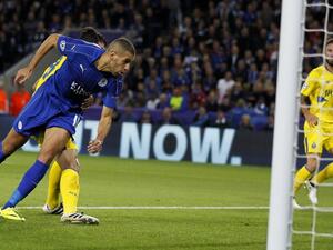 Leicester City's Algerian striker Islam Slimani heads the ball to score his team's first goal during the UEFA Champions League group G football match between Leicester City and Porto at the King Power Stadium in Leicester, central England on Septmeber 27, 2016.
Ian Kington / AFP