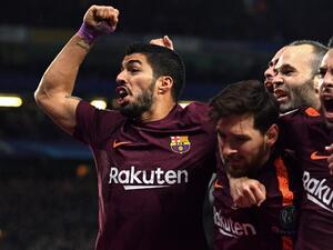 لاعبو برشلونة يحتفلون بهدف ميسي