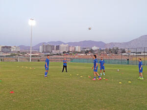 A recent photo of the Syrian team training at the outer field of the Sultan Qaboos Sports Complex in Muscat (source: Muscat Daily)