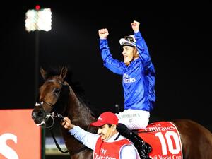 Jockey Christophe Soumillon gestures as he rides Thunder Snow after winning the Dubai World Cup horse race at the Dubai World Cup in the Meydan Racecourse on March 31, 2018 in Dubai. 
KARIM SAHIB / AFP