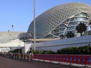 Cyclists ride their bikes during the Abu Dhabi tour from the Yas Marina Circuit to Yas Mall where the tour finishes in the Emirati capital Abu Dhabi, on October 11, 2015. AFP PHOTO / STR
STR / AFP