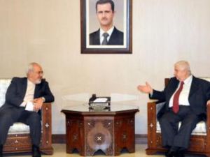 وزيرا الخارجية الايراني محمد جواد ظريف والسوري وليد المعلم