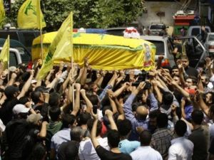 تشييع أحد مقاتلي حزب الله من الذين قتلوا في المعارك بسوريا