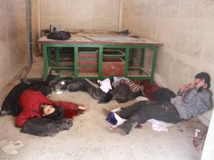 صورة لضحايا من الثوار اعدمتهم داعش وقد ضبطت الصور بعد استرجاع مقرهم الرئيسي