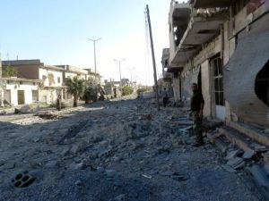 اثار التدمير في الحولة/أ.ف.ب