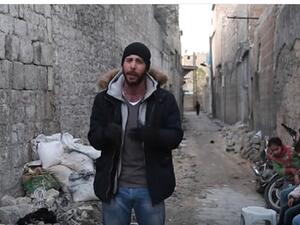 Rami Jarrah reporting from Aleppo after a bombing strike. (AFP/File) 