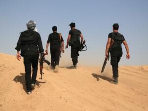 مقاتلون من المعارضة في الرقة/أ.ف.ب