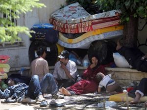 عائلة سورية لاجئة في بلدة عرسال اللبنانية/أ.ف.ب