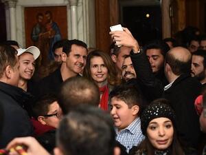 الرئيس السوري بشار الاسد وعقيلته في كنيسة العذراء