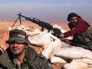 جندي سوري بحوزته سلاح "بيتشينيغ" الروسي