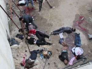 جثث رجال مقيدين ومعصوبين وجدت في مقر "داعش" في حلب/أ.فزب