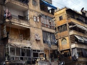 مبان مدمرة في حي الشيخ مقصود بحلب/أ.ف.ب