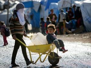 لاجئون سوريون في مخيم باربيل/ العراق/أ.ف.ب