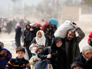 خروج المدنيين من مدن وبلدات الغوطة الشرقية قرب دمشق لا يزال متواصلا