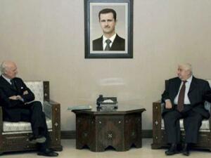 موفد الامم المتحدة الى سوريا دي ميستورا ووزير الخارجية السوري وليد المعلم