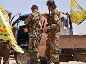 مقاتلون من قوات سوريا الديمقراطية