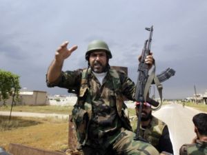 الجيش السوري في احدى القرى القريبة من القصير/أ.ف.ب