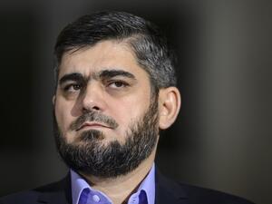 Chief negotiator for the main Syrian opposition umbrella group the High Negotiations Committee (HNC), Jaysh al-Islam's Mohammed Alloush. (AFP/File)