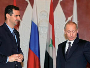 Syrian President Bashar al-Assad and Russian President Vladimir Putin (AFP)