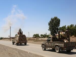 Syrian Democratic Forces (SDF) on the outskirts of Raqa, June 7, 2017, two days after finally entering the northern city. (Delil Souleiman/AFP)