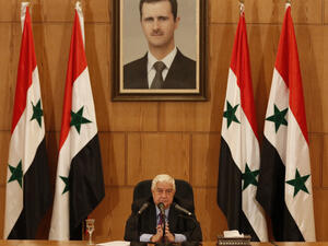 Syrian foreign minister Waleed Muallem speaks at conference in Damascus. (AFP) 