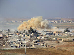 Smoke rises from buildings in the area of Tal Sharba following government air strikes on the outskirts of the northern Syrian city of Aleppo on December 27, 2015. (AFP)