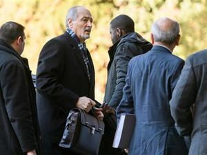 Syria's United Nations ambassador and head of the government delegation Bashar al-Ja’afari (2nd L) leaves after a meeting with UN Special Envoy for Syria Staffan de Mistura during the first day of a new round of Syria peace talks in Geneva, Switzerland, on February 23, 2017. (AFP/File) 