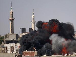 A ball of fire rises from a building following a reported air strike by Syrian government forces on a rebel-held area in the southern city of Daraa, on June 11, 2017. (Mohamad Abazeed/AFP)