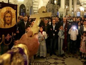 Greek Orthodox Christians attend a Good Friday mass at the Meriamiah Church in the Syrian capital Damascus. (AFP/File)