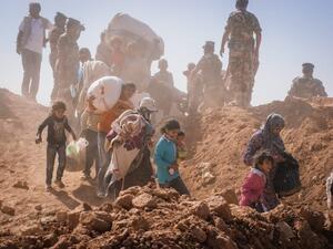 Syrian refugees at the Jordanian border in 2014. (AFP/File)