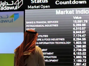 On Wednesday, SAAB and Alawwal Bank topped the hikes of the Saudi Stock Exchange (Tadawul) after their possible merger announcement. (AFP/ Fayez Nureldine)