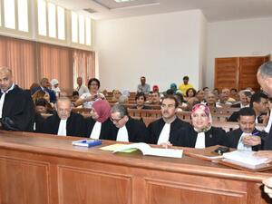 Lawyers in charge of the Kamal Matmati case, a member of the Islamist movement Ennahdha who was arrested in 1991 during Ben Ali's rule and tortured to death, gather in the Gabes court on May 29, 2018. (AFP/ STRINGER)
