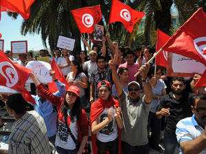 Tunisia's public debt continued to rise to almost 61.9 percent of GDP at the end of 2016, compared to 53.4 percent ​​originally projected. (AFP/File)