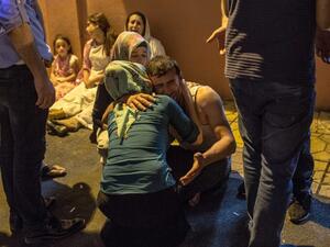 Relatives grieve at hospital August 20, 2016 in Gaziantep following a late night militant attack on a wedding party in southeastern Turkey. (AFP/Ahmed Deeb)