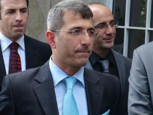 This photo taken on December 26, 2013, shows Turkish prosecutor Muammer Akkas as he walks out from a courthouse in Istanbul. [AFP]