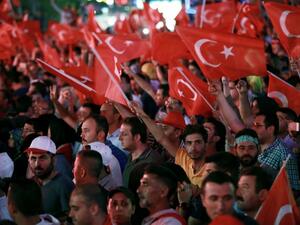 Pro-Erdogan supporters celebrate in Ankara on July 17, 2016 following the failed coup attempt. (AFP/Adem Altan)  