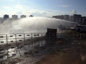 Turkish riot police use water cannons on February 9, 2016 in Diyarbakir, southeastern Turkey, during the Ziraat Turkish Cup football match after a Kurdish player was suspended. (AFP/Ilyas Akengin)