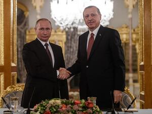 Turkish President Recep Tayyip Erdogan and his Russian counterpart Vladimir Putin agreed pn December 14, 2016 in a phone call that violations of a ceasefire deal agreed for the Syrian city of Aleppo should stop, Turkish presidential sources said. (AFP/Ozan Kose)