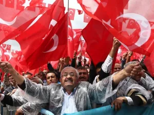 Supporters cheer Turkey's President Recep Tayyip Erdogan as he addresses an election rally in Golbasi. (AFP Photo)