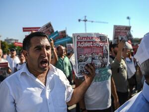 "We Want Justice" reads cover of opposition paper Cumhuriyet daily as protesters march on courthouse (Ozan Kose/AFP)