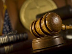 A manager won his appeal as a court cleared him of hugging a female employee and groping her when she arrived at his office to get her labour contract translated. (AFP/ File Photo)