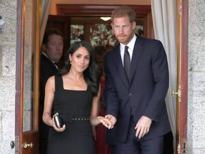 Harry and Meghan attend a summer party at the British Ambassador's residence at Glencairn House
(AFP/File)