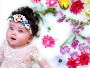 The little girl has become used to all the attention and posing for pictures. She has become quite the expert poser. (Daily Mail)