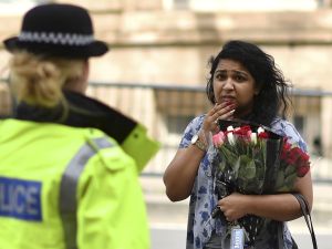British Prime Minister said the "cowardice of the attacker was met by the bravery of the emergency services and the people of Manchester". (AFP) 