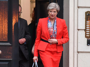 The march was organised by the "Movement for Change", who called for "class war" to "bring down the government" in response to the Grenfell Tower fire. (AFP) 
