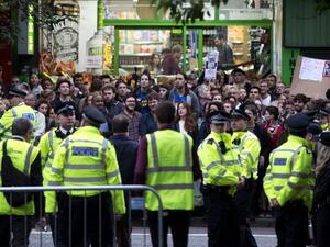 Supporters gather outside the Union Chapel as they wait for the arrival of Britain's opposition Labour Party leader Jeremy Corbyn at an election rally at Union Chapel in Islington, north London on June 7, 2017. (AFP/Isabel Infantes)