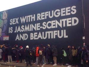 A piece of street art containing the phrase “sex with refugees is jasmine-scented and beautiful” in large letters has caused controversy after it appeared in London over the weekend (Twitter)