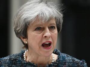 British PM Prime Minister Theresa May makes a controversial statement outside 10 Downing Street on May 3, 2017. (AFP/Justin Tallis)