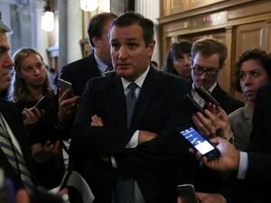 US Sen. Ted Cruz speaks to members of the media at the Capitol September 28, 2016 in Washington, DC after the Senate voted to override President Obama's veto of a bill allowing families of 9/11 victims to sue the Saudi government. (AFP/Alex Wong)