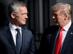 NATO Secretary General Jens Stoltenberg (L) stands next to US President Donald Trump ahead of a NATO Summit in Brussels on July 11, 2018. (Brendan Smialowski/ AFP)